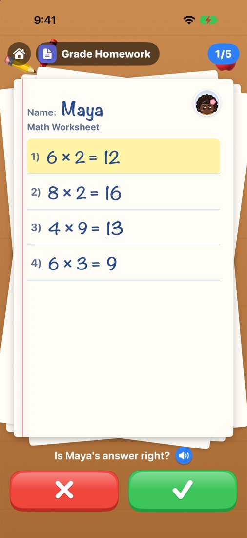 Grading Lily's math worksheet with check and cross buttons